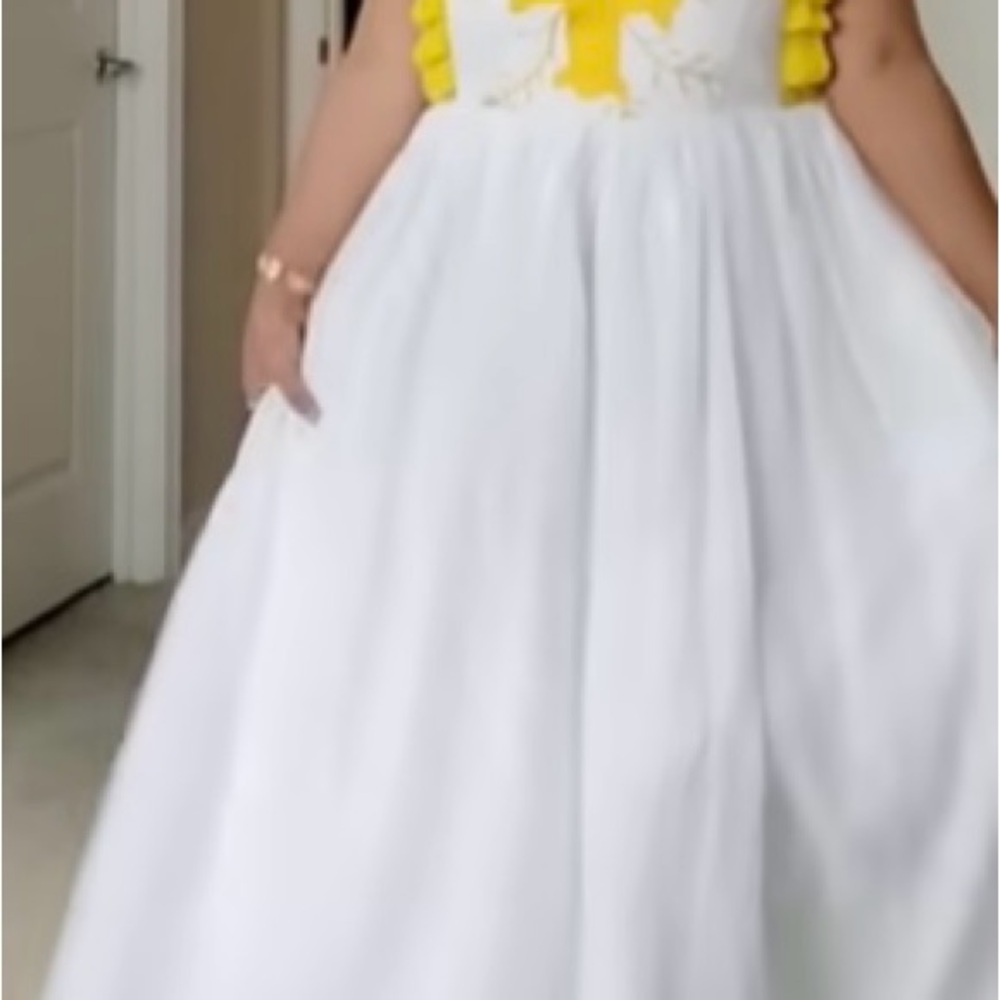 White Dress with Yellow Embellishments